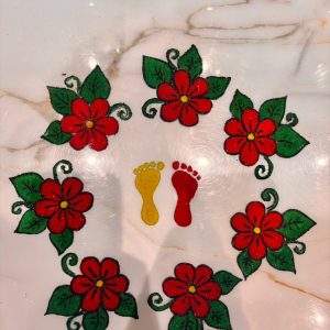 Handmade Red Flower Round Rangoli Design